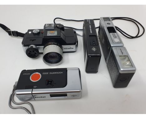 A Minolta 110 Zoom camera, an Agfamatic 6008, and Agfamatic 2000, and a Minolta 470 camera (4)Provenance:  Part of a vast sin