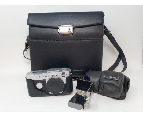 An Olympus-N F, with leather outer case, with various accessories, in fitted leather camera bagProvenance: Part of a vast sin