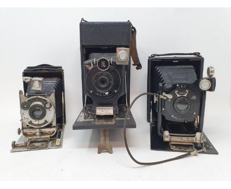 A Koilos folding camera, in leather outer case, two folding cameras and two boxes of plates (5)Provenance: part of a vast sin