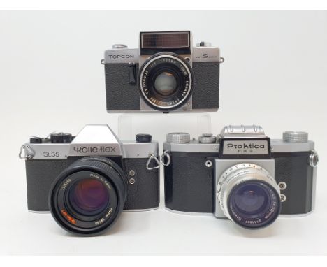 A Rolleiflex SL35 camera and a Praktica FX3 camera and a Topcom camera (3)Provenance: Part of a vast single owner collection 