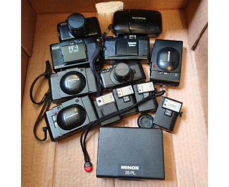 A Minox 35 PL camera, boxed, an Olympus XA Macro camera, an Olympus XA camera, an Olympus XA 1 camera, a Ricoh FF=1 camera, a