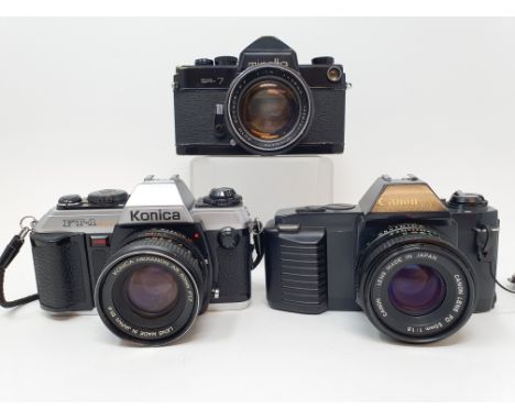 A Minolta SR-7 camera, a Canon T50 camera and a Konica FT-1 camera (3)Provenance: Part of a vast single owner collection of c