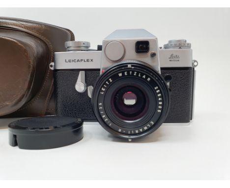 A Leica Leicaflex camera, serial number 1115659, with leather outer caseProvenance: Part of a vast single owner collection of
