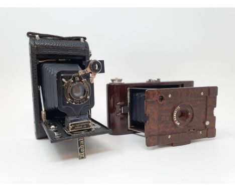 A Kodak Hawkette 2 bakelite folding camera, with outer leather case, and a Kodak folding camera, with outer leather case (2)P
