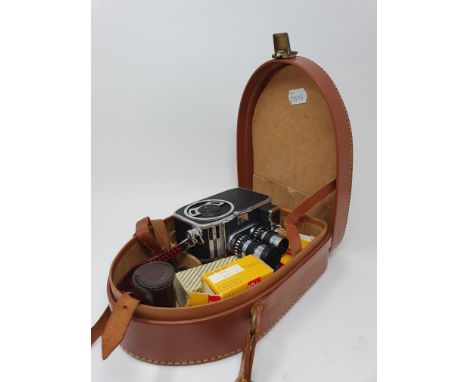 A Bolex Paillard Cine camera, with various accessories, in fitted leather caseProvenance:  Part of a vast single owner collec