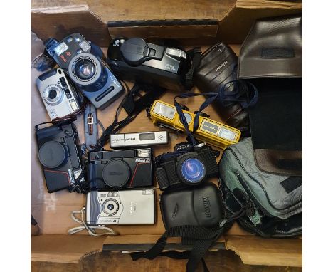 A Pentax 120 Mi camera, a Nikon L35 camera, an Olympus AZ-300, a Nikon L35, a Minolta Mark II camera, a Minolta Riva 165i cam