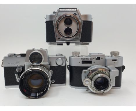 A Petri Flex 7 camera, a Kodak 35 camera and a Agfa Flexilette (3)Provenance: Part of a vast single owner collection of camer