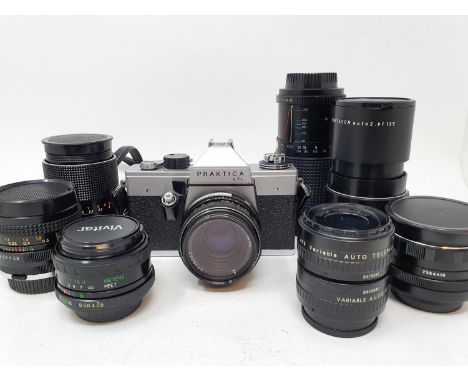 A Praktica LTL camera, eight lenses, and a camera bagProvenance: Part of a vast single owner collection of cameras, lenses an