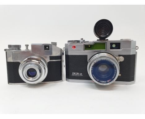 A Petri 2.8 camera and a CMF Comet II camera (2)Provenance: Part of a vast single owner collection of cameras, lenses and pho