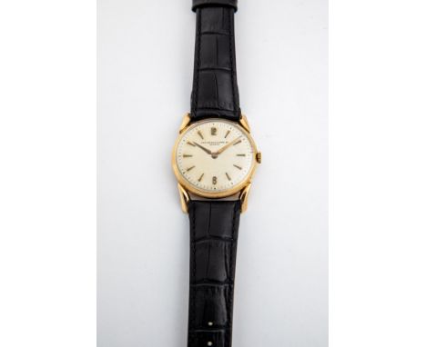 Herrenarmbanduhr Patek Philippe, Genf um 1935 Rundes, 18 kt GG Gehäuse. An formschönen Bandanstößen schwarzes Lederarmband mi