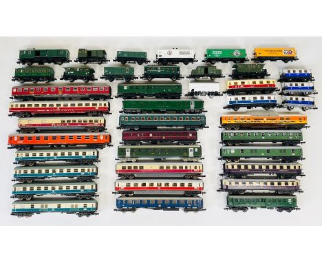 40x&nbsp;N Gauge Continental Outline Wagons and Coaches. Manufacturers include but not limited to: Fleischmann, Trix, Arnold,
