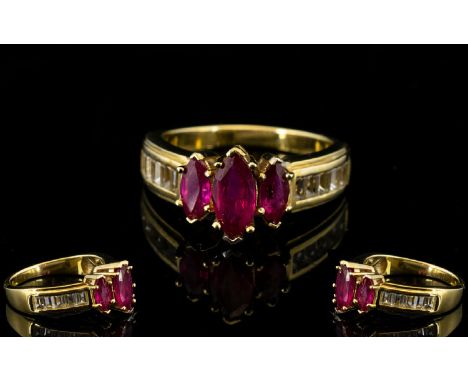 Ruby Marquise and White Topaz Ring, a 1ct marquise cut ruby flanked by two smaller, similar, rubies, forming a central motif 