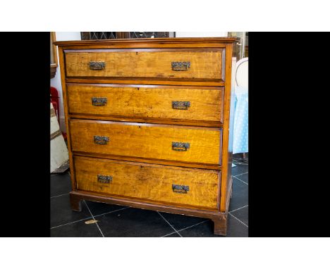 Maple Front Chest Of Drawers Four long drawers with brass pull handles, raised on bracket feet, 46 inches high, 42 inches wid