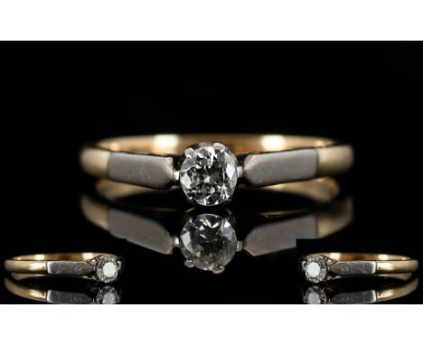 18ct Gold and Platinum Single Stone Diamond Set Dress Ring. The Brilliant Cut Diamonds of Good Colour, Commercial White. Est 