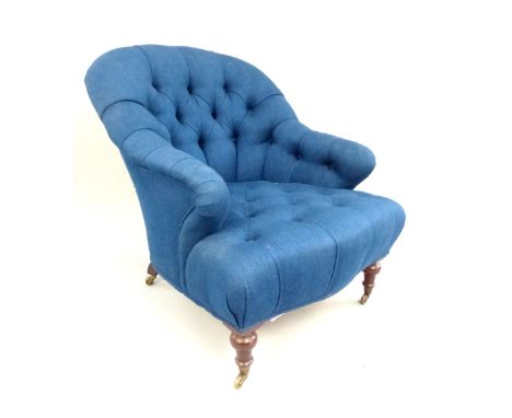 Tub chair, of Georgian style, button back upholstery, turned mahogany feet and castors