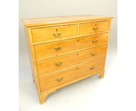 Pine chest, early 20th C, two over three graduated drawers, brass handles and escutcheons, bracket feet, 100cm w