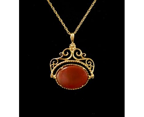 9ct yellow fob pendant, with pierced and agate design, suspended on yellow gold chain 