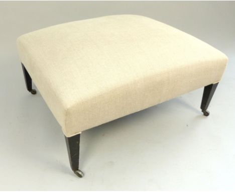 Large upholstered stool, the rectangular seat covered in an oatmeal fabric, on ebonised square tapering legs, 76cm w