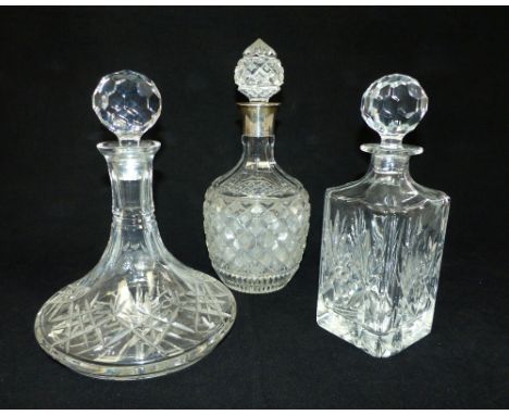 Hobnail cut decanter with a silver collar, Birmingham 1937, 30cm h, together with a cut glass ship's decanter and another dec