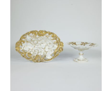 Fine Meissen porcelain dish and raised tazza, both executed in white glaze with richly gilded floral and leaf decorations in 