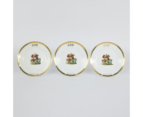 Set of 3 plates of fine white porcelain with multi-coloured image of Saint George on horseback slaying the dragon with a gild