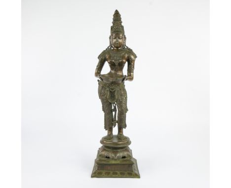 Finely worked bronze temple figure of a devata (goddess or temple guardian) LAKSMI, standing in a stately pose on a lotus-sha