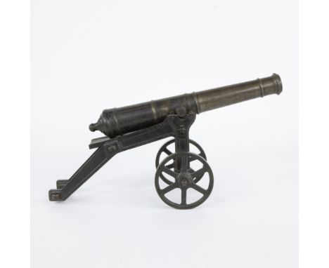 Replica of a classic field gun with brass barrel, English, late 18th century and cast iron carriage with spoked wheels, 19th 