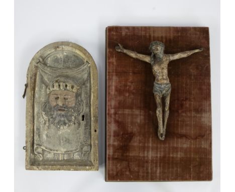 2 religious wood carvings, Christ on the Cross and Relief in wood (door of a tabernacle), depicting the face of Christ with c