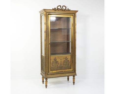 Louis XVI style display cabinet, circa early 20th century with gilded wooden frame with carved garlands, ribbon motif and bow