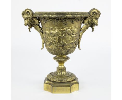 Beautiful decorative bronze jardinière in neoclassical style, richly decorated with dancing putti and grape vines, on a base 