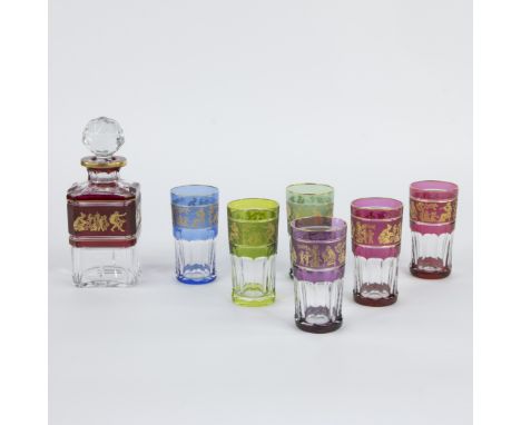 Val Saint Lambert, luxurious whiskey set consisting of a cut crystal decanter, signed and six colored glasses with gold decor