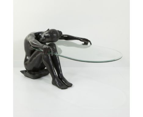 Coffee table 'Valenti', base in the shape of a naked woman on a bronze cushion with an oval heavy glass topSalontafel 'Valent