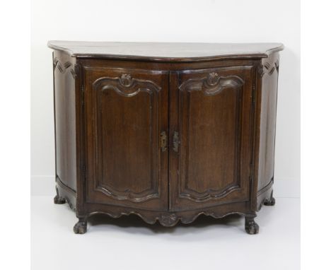 Oak two-door cabinet with curved front, double doors with profiled panels, rocaille decorations and floral motif in Louis XV 