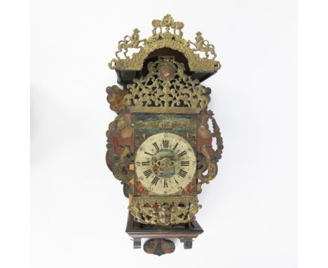 Frisian chair clock with hand-painted wooden case, gilded carving and brass dial with Roman hour numerals and Arabic minute r