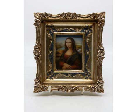 Two 20th century framed Russian icons, hand painted with ornate metal surrounds, one of Virgin and the other Jesus, both 24.5