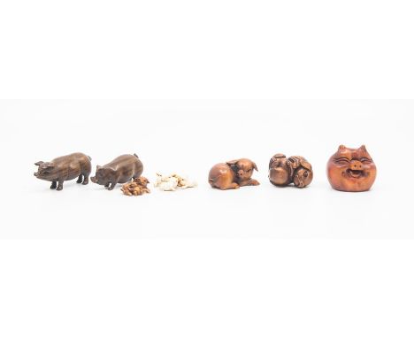 Japanese pig netsuke collection to include 6 carved&nbsp;wood, mostly signed and a ivory group of sow with two piglets, signe