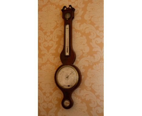 An early 19th Century mahogany banjo barometer and thermometer, with spirit gauge, made by F Amadio and Sons, having a swan n