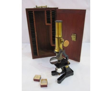 Mahogany cased microscope with various glass slides (mostly empty) and set of boxed glass circles