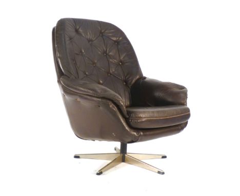 A 1970's brown and button upholstered tub chair on an aluminium five star base CONDITION REPORT: Heavy corrosion to base, som