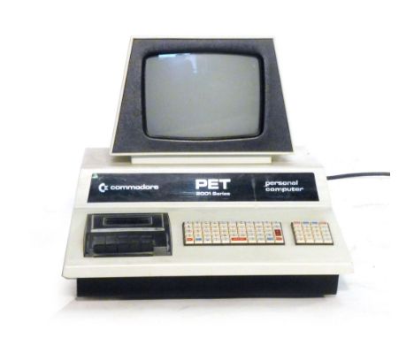 A Commodore PET 2001 personal computer, h. 41 cm, together with cassette and manual CONDITION REPORT: Working order unknown,n