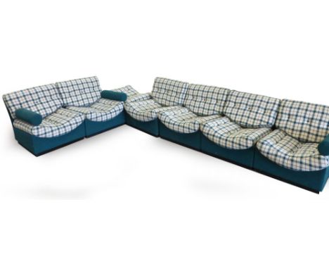 A seven piece fully upholstered modular sofa by Mogens Koch CONDITION REPORT: Good for age, minor wear, stickers to base of s