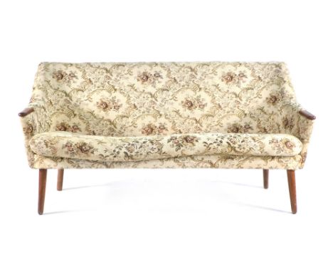 A Danish 1950's upholstered two seater sofa with exposed teak arms on tapering legs CONDITION REPORT: Upholstery very tired