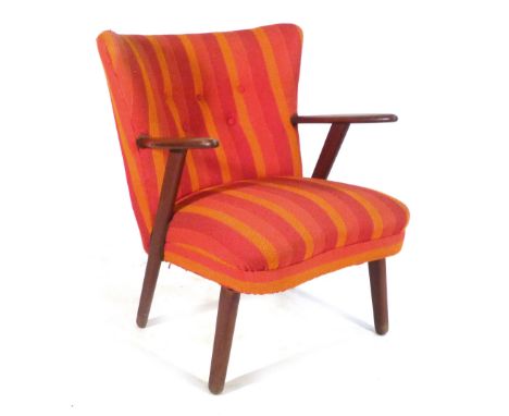 A 1940's teak framed and button upholstered lounge chair CONDITION REPORT: frame to upholstery structually sound, minor wear