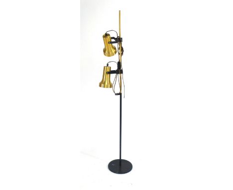 A 1970's twin spot adjustable standard lamp with brass coloured shade CONDITION REPORT: Working order unknown and damage may 