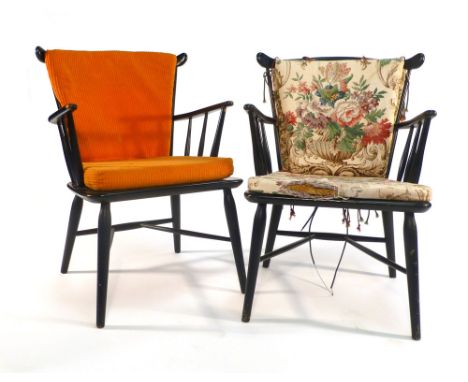 A pair of black stained stick back armchairs on tapering legs, in the manner on Borge Mogensen
 CONDITION REPORT: loose uphol