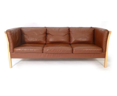 A Stouby beech framed and leather upholstered three seater sofa and a matching two seater sofa CONDITION REPORT: Leather dama