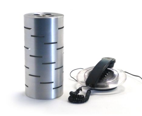 A 1970's stainless steel lamp shade of cylindrical form together with a Bush neon-flashing telephone  CONDITION REPORT: Worki