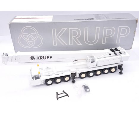 Conrad, a boxed 1:50 scale No.2077 Telescopic Crane Type 250 "GMK "Krupp" in White/Black. Although unchecked for completeness
