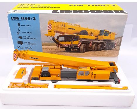 Conrad, a boxed 1:50 scale No.2090 &nbsp;Liebherr LTM 1160/2&nbsp; Mobile Crane in&nbsp; Yellow/Orange &amp; Grey. Although u