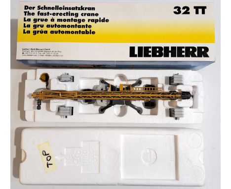 NZG, a boxed 1:50 scale No.521 Liebherr 32TT Fast Erecting Crane. Please note the hook hanger has been remade therefore condi